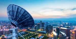 satellite dish space technology receivers in city representing voip phone systems and switch-off